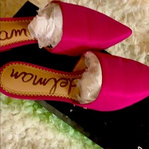 Pink Silk mules.